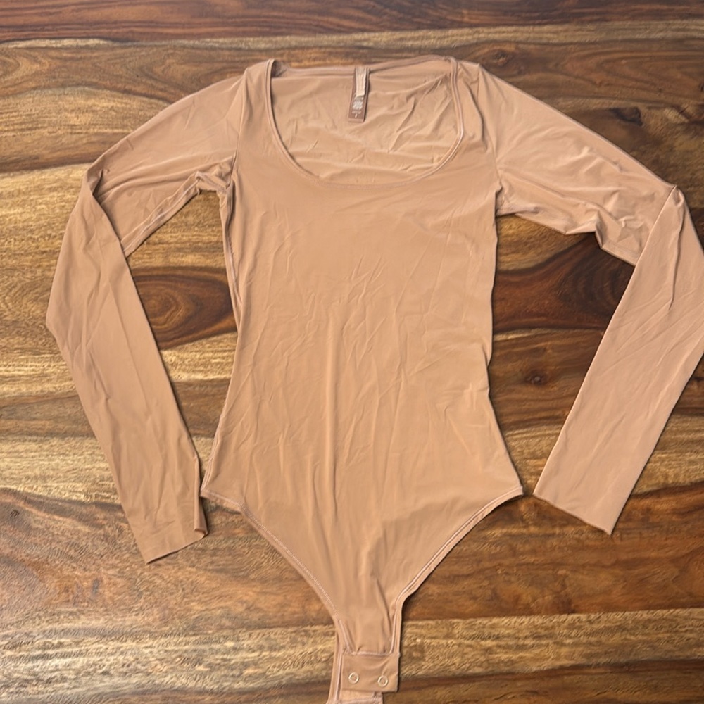 New,never worn Skims seamless thong bodysuit